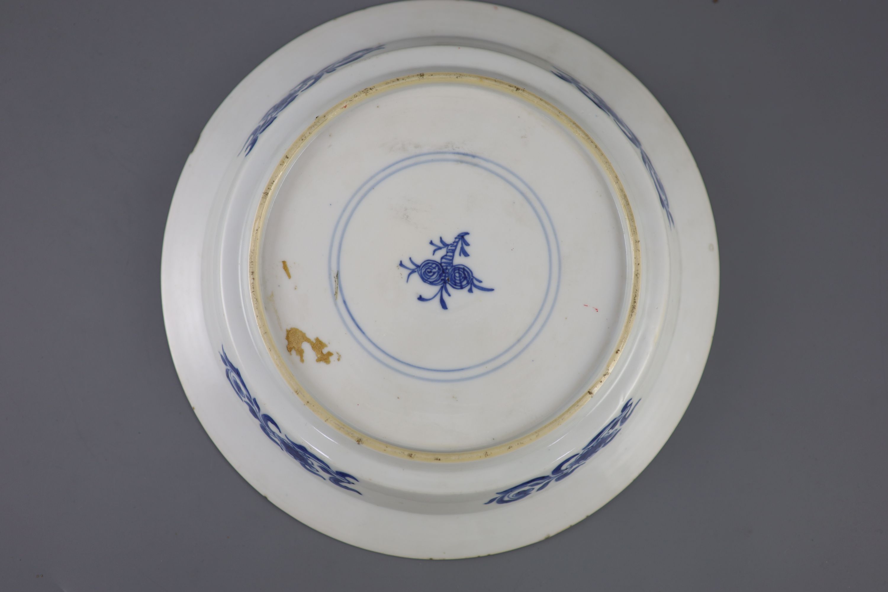 A Chinese blue and white sage and phoenix dish, Kangxi period, 20.8cm diameter